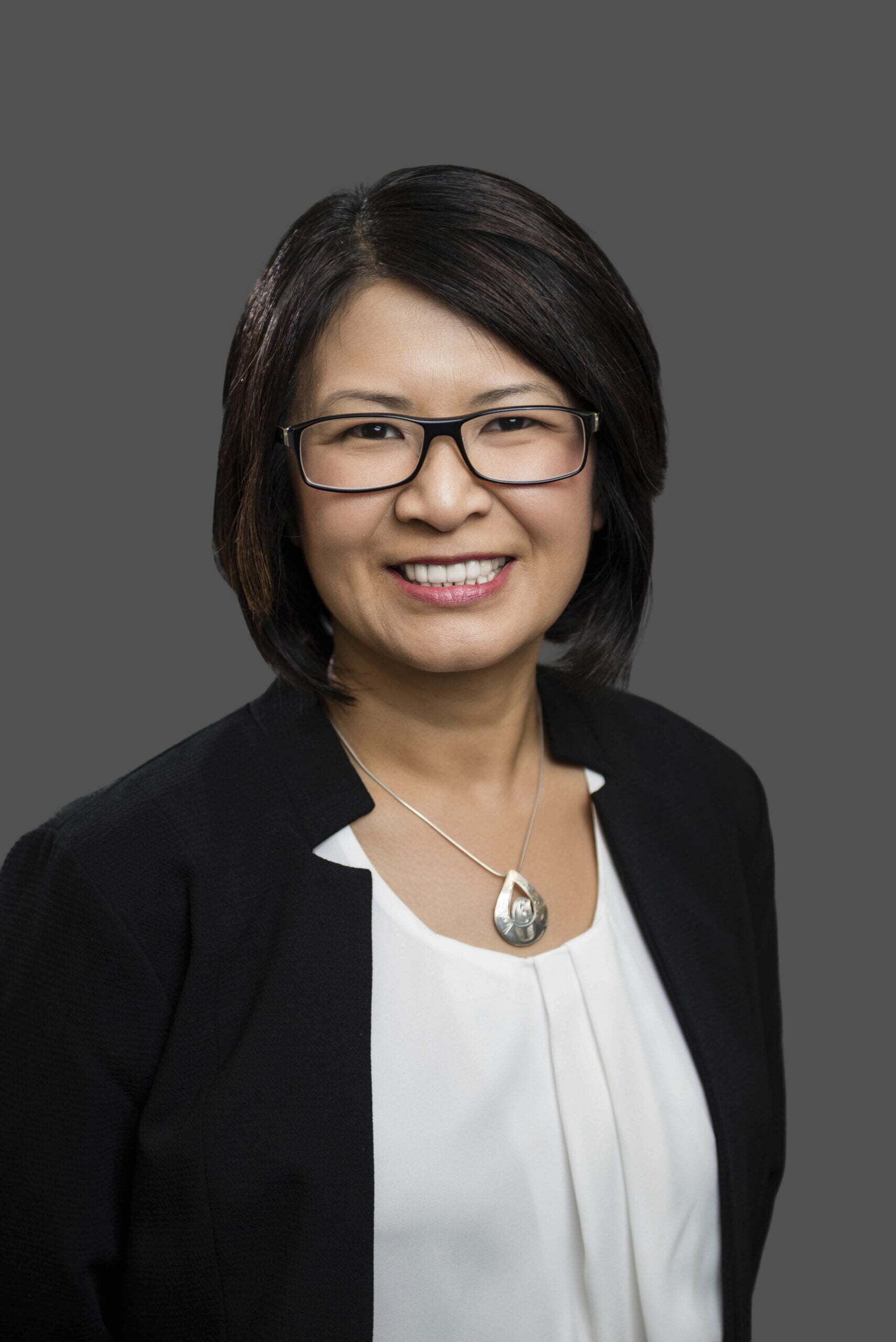 BC Liberals-14- Smiling woman with glasses and necklace