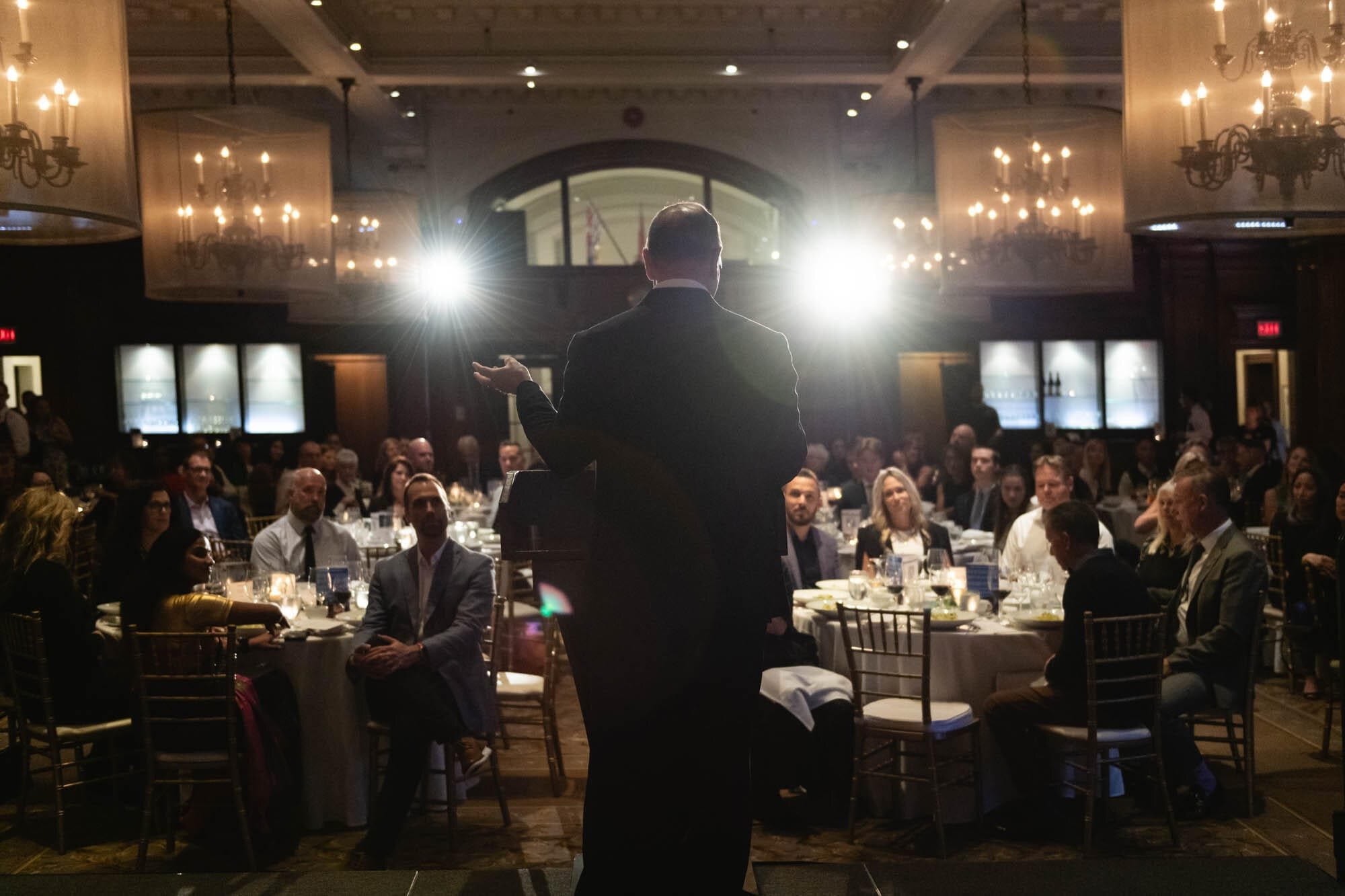 Interntaional Justice Mission-2 Speaker addressing a dinner event audience in Vancouver club