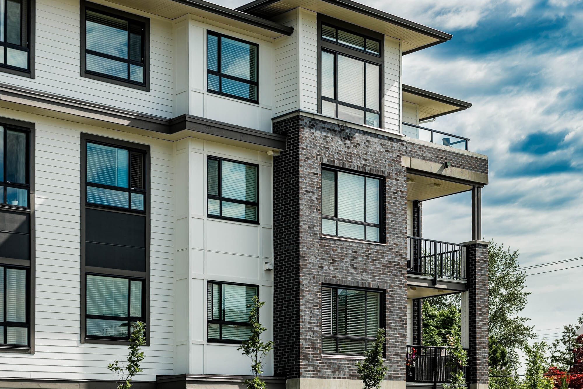 Cronus Masonry-6 Modern apartment building with balconies