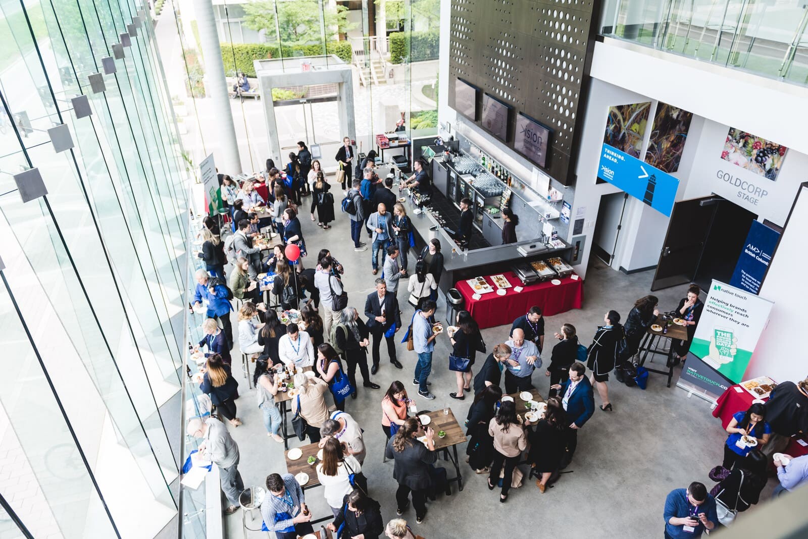 Crowded business networking event in modern venue