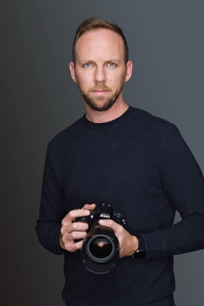 Brett Portrait-2 Photographer holding Nikon camera