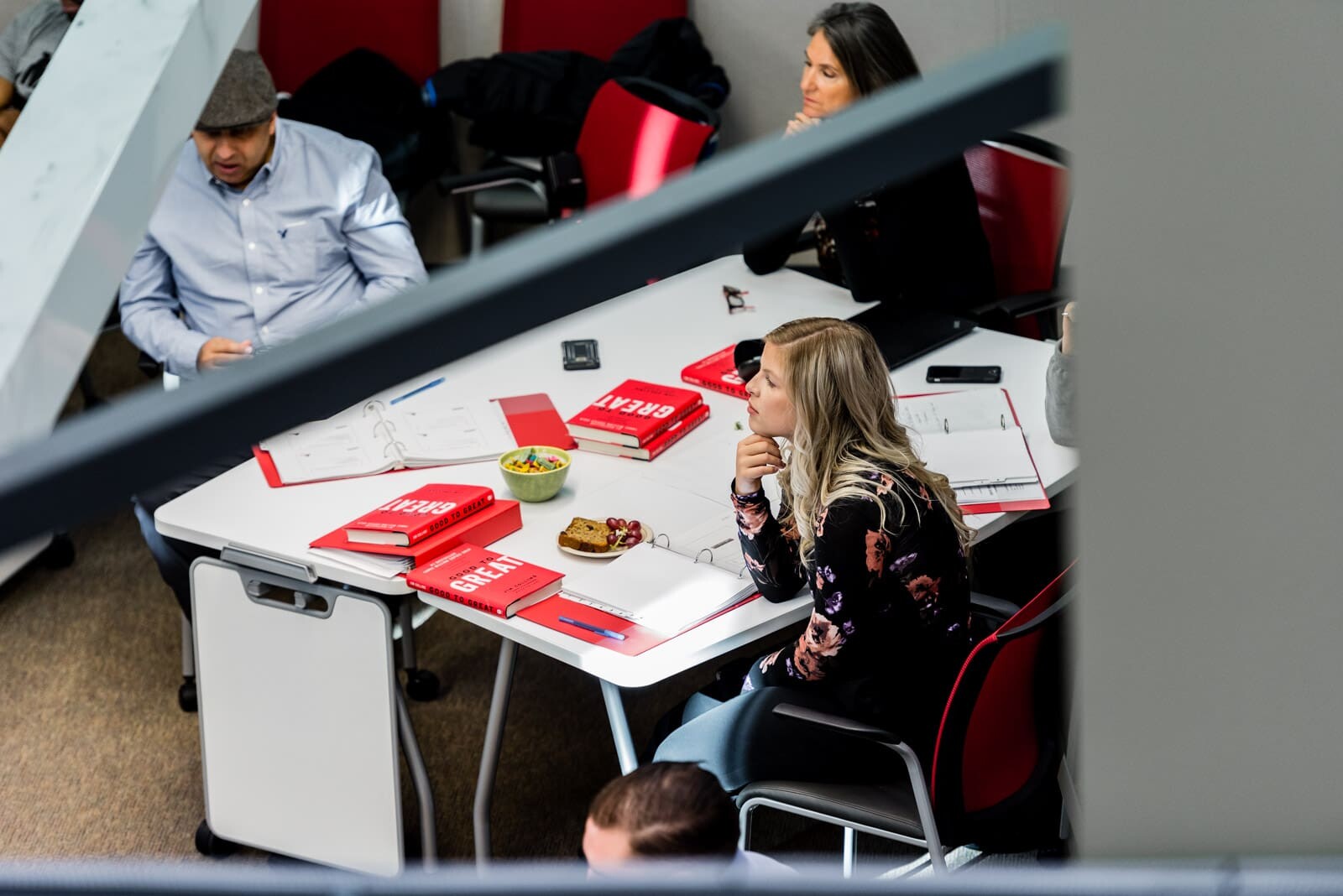 People in a meeting around a table