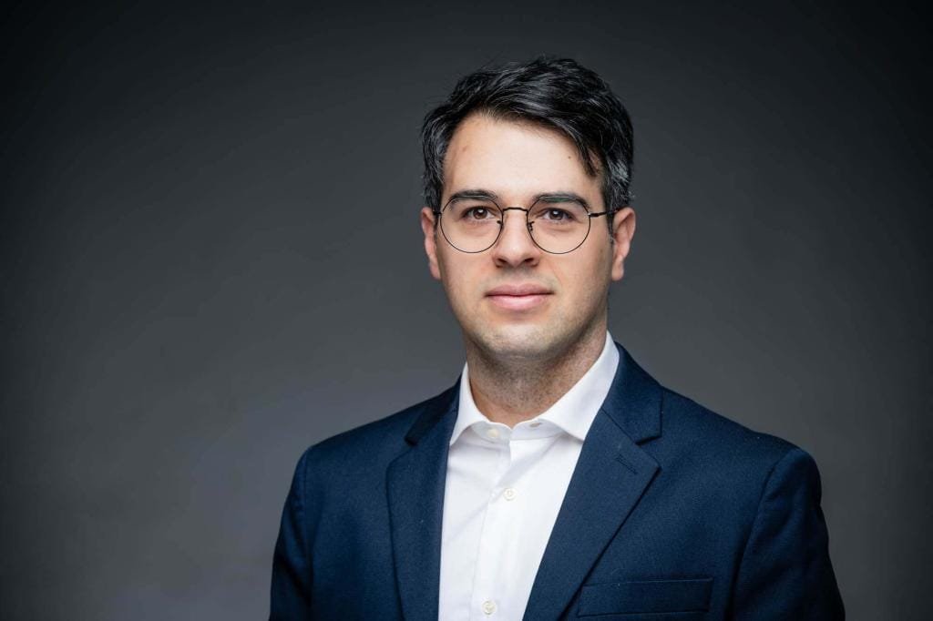 GeaCongress Headshots-9 Man in glasses and suit portrait