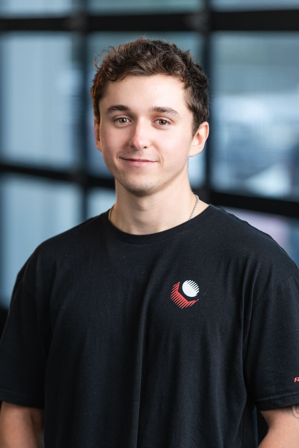 Rad Torque Web-10 Smiling person in black shirt, indoor setting