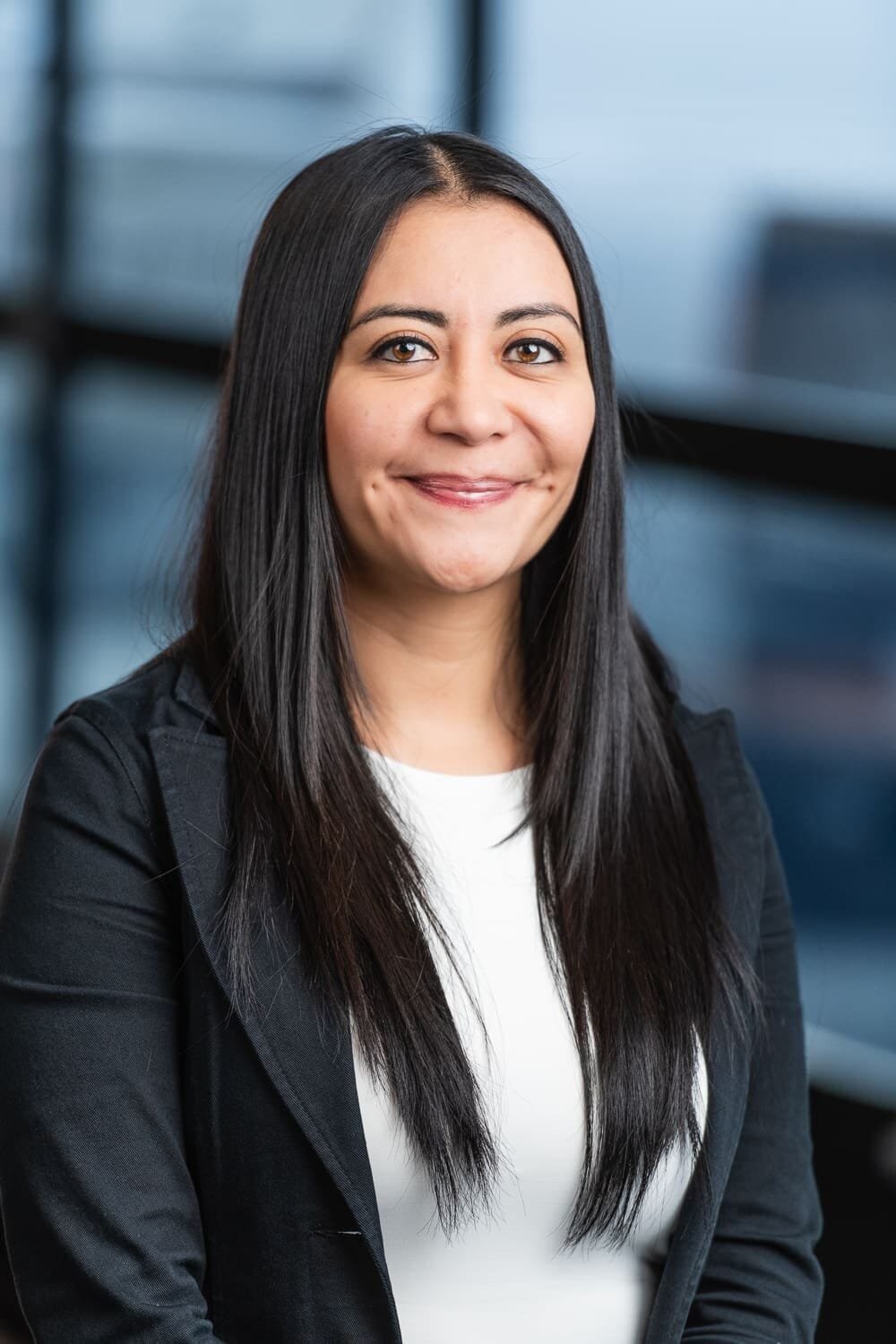 Rad Torque Web-6 Woman in a business suit smiling