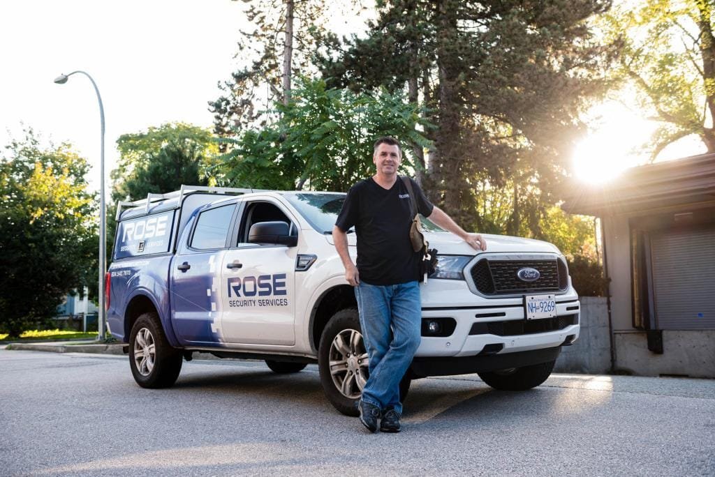 Rose Security Services truck with technician.
