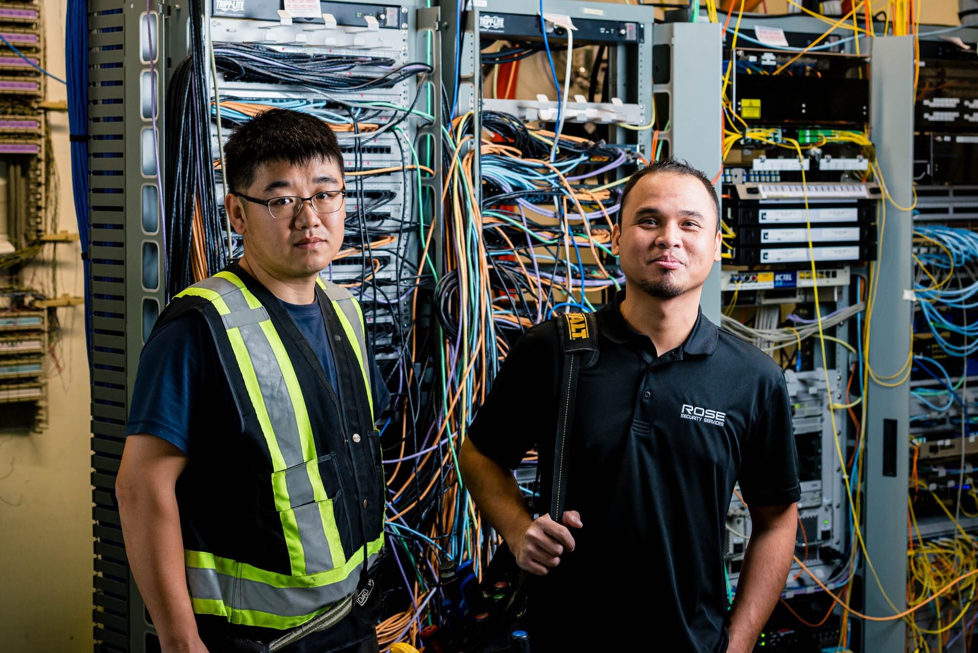 Rose Security-8 Access Control technicians in a server room