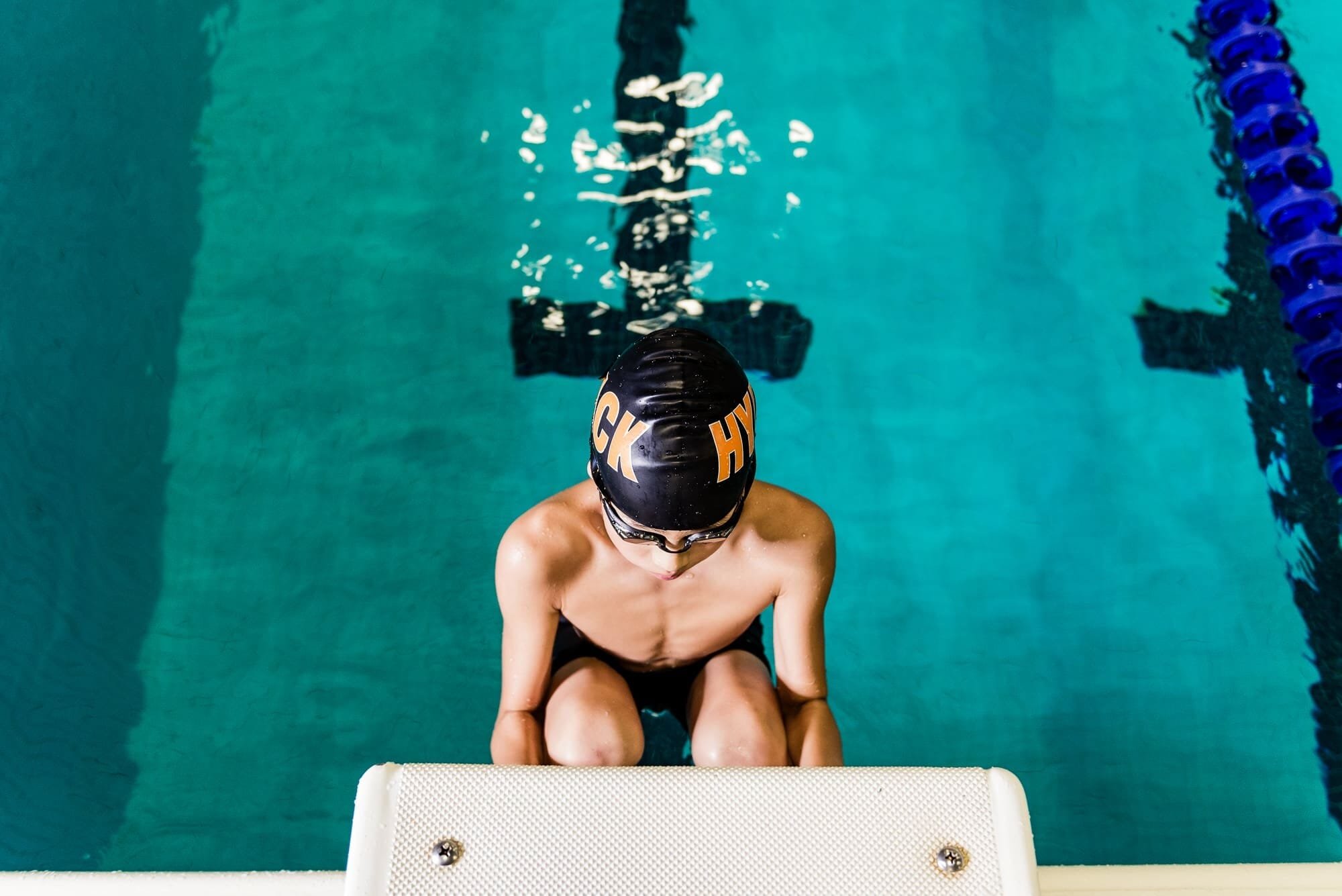 BAP_1402-Website-2 Swimmer on starting block at pool