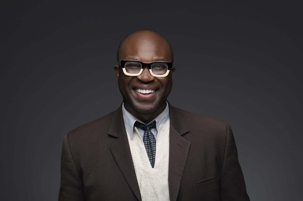 Man in suit jacket smiling