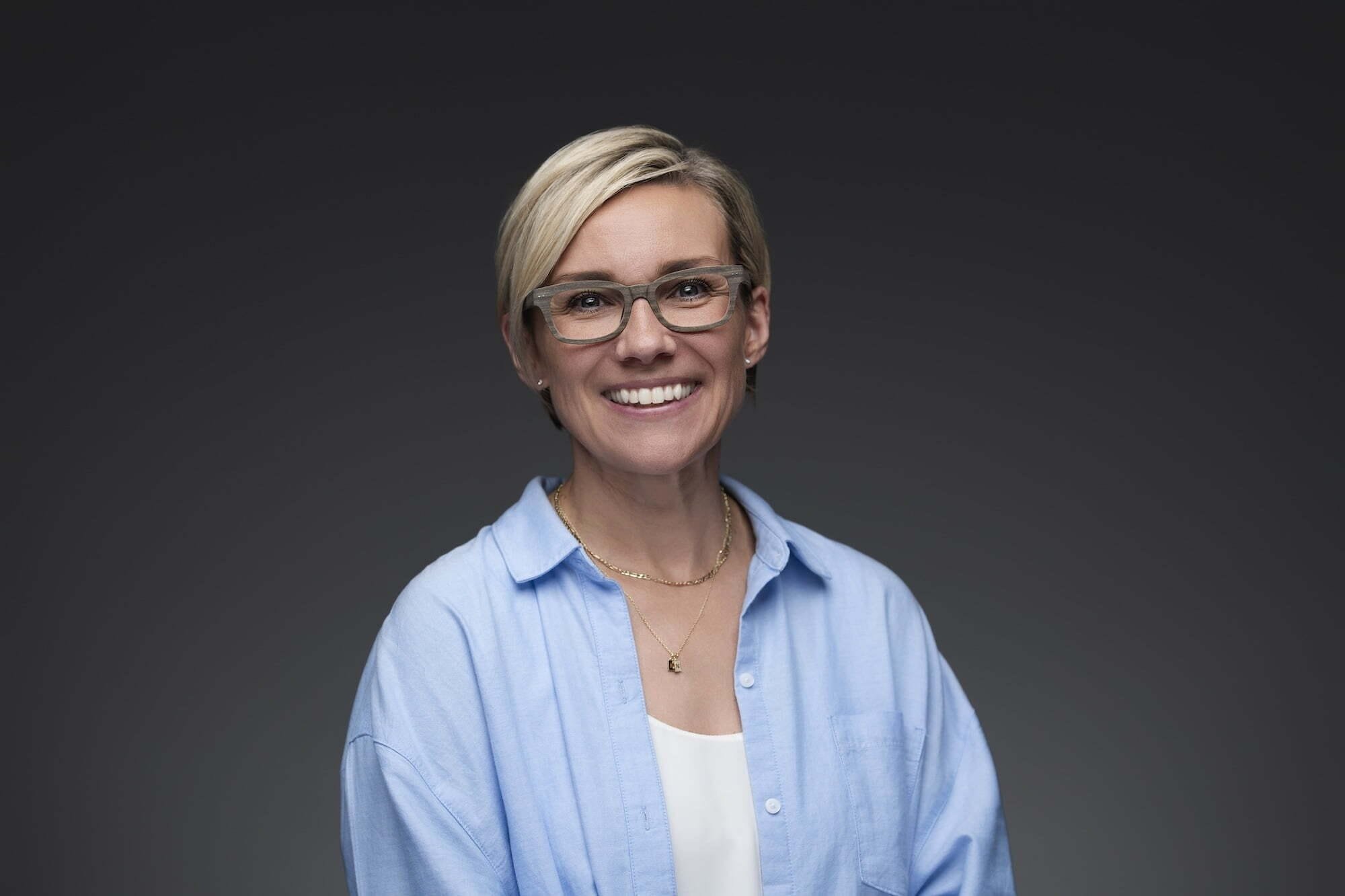 Hagarty_Natalie_084-0924--retouched Smiling woman in glasses and blue shirt