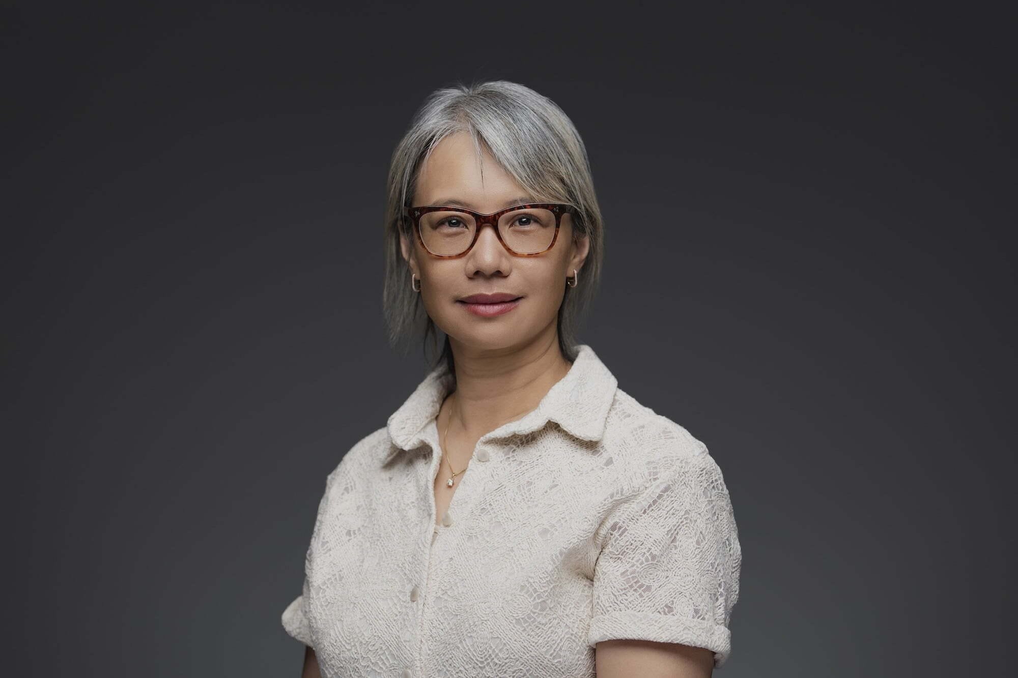 Lee_Eleanor_676-0481--retouched Woman with glasses and short hair.