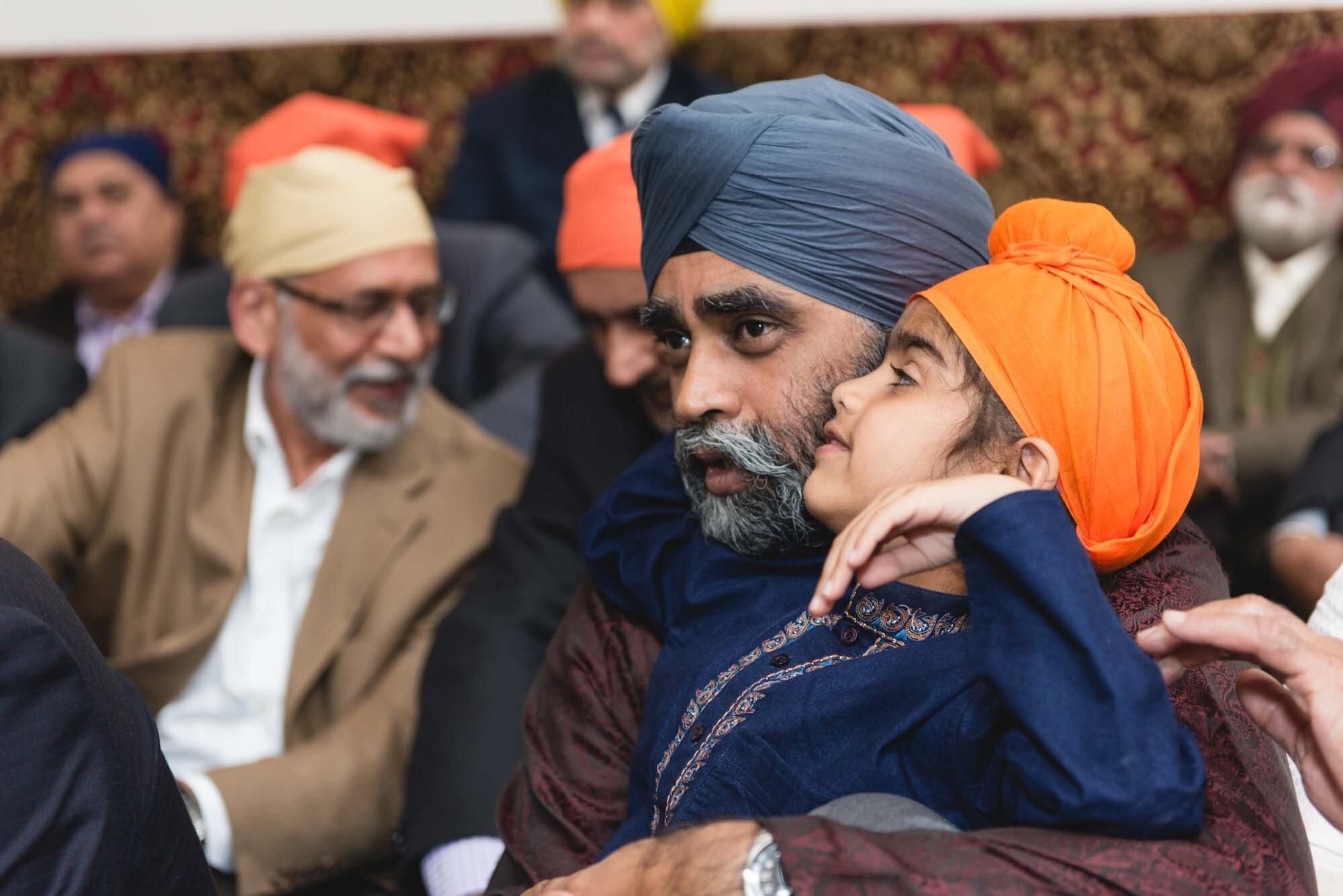 West Light Media Event Photography-23 Man and child at a Sikh gathering.