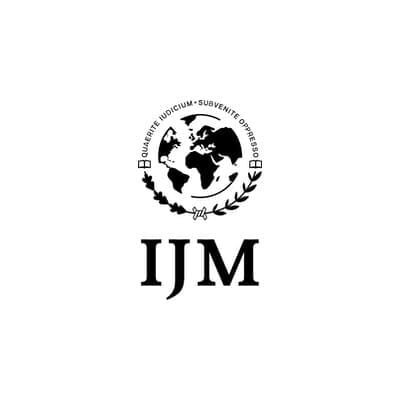 IJM logo with globe and laurels